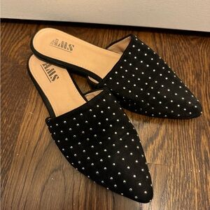 Black mules with stud design. Size 7.5.